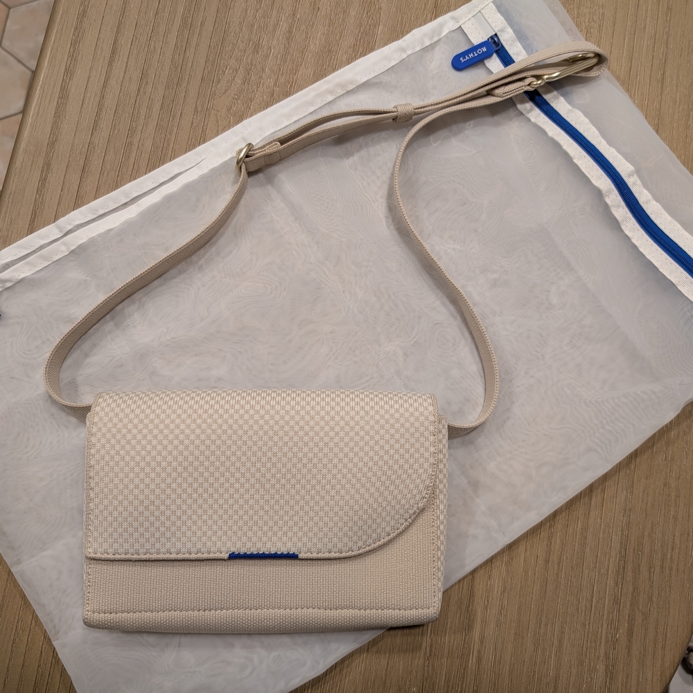 Rothy's Cream Belt Bag with Flap Closure and Adjustable Strap